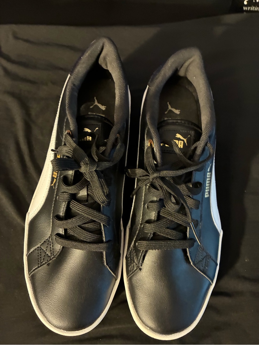 Puma Black and Gold Platform Sneakers